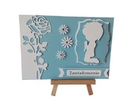 ZAWIADOMIENIA KOMUNIA CHŁOPIEC KLĘCZĄCY RÓŻA C6 BŁĘKIT - BIEL