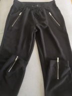 Luźne spodnie z zamkami 38