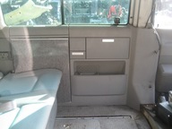 VW T4 LIFT MULTIVAN 00-04R TAPICERKA BOCZEK TYŁ LEWY STOLIK