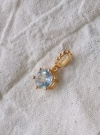 Wisiorek srebrny pozłacany z niebieskim topazem