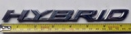 EMBLEMAT NAPIS HIBRID LEXUS RX 2015 - 2019 75473-48110