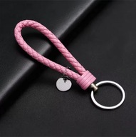 Praktyczny różowy pleciony brelok / smycz lekki i wygodny dodatek do kluczy