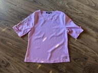 Piękan różowa bluzka na krótki rękaw kokardka i perełki na rękawach