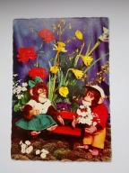 Maskotki, pluszaki - para małpek wśród kwiatów - pocztówka