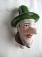 ŚMIESZNY KRASNAL przedwojenny PORCELANOWY KOREK-NALEWAK DO BUTELKI-KARAFKI