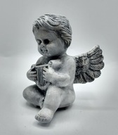 ceramiczny śliczny siedzący aniołek anioł z lirą