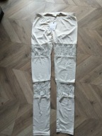 Szwedzkie spodnie legginsy damskie M ekri koronka otulające getry