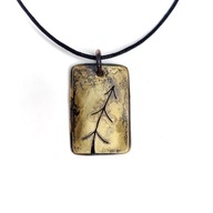 Wisior z mosiądzu i alpaki "Siekierezada 1".