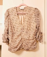 Elegancka bluzka z bufiastymi rękawami roz.L