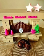 Przytulny kominek dla lalki Barbie.