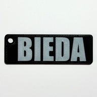 Brelok z napisem BIEDA – śmieszny prezent, zabawny dodatek do kluczy