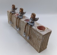 Świecznik na 4 świece Trzy szczęśliwe Aniołki zwisające nóżki świetny 22cm