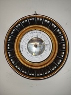 Piękny okrągły barometr w zdobionej obudowie