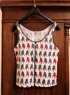 Biała bluzka w pieski, bez rękawów, rozpinana