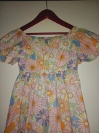 Piękna sukienka motylkowe rękawy 122/128