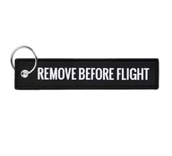 Breloczek REMOVE BEFORE FLIGHT 13cm czarny