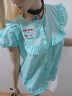 błękitna bluzka bufki z falbankami pastelowa dekolt guziki M