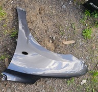 SUZUKI BALENO II 15-22 BŁOTNIK LEWY PRZEDNI ORYGINAŁ