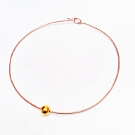 Kolia z miedzi z pozłacaną kulką.