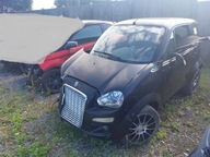 GRECAV SONIQUE MICROCAR BLOTNIK PRZÓD LEWY ZAWIESZENIE SANKI LAMPA MASKA