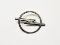 ZNACZEK EMBLEMAT NA TYŁ W KLAPE KLAMKE 53x69 22306 GM OPEL CORSA B FL LIFT