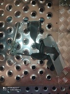 Dopinacz prawy Opel CORSA D 13214638 pas bezpieczeństwa