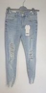 Spodnie XS skinny m.sara z przetarciami