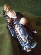Chiński mędrzec - szkliwiona figurka ceramiczna 20,5 cm.