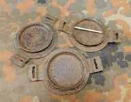 Trzy zaślepki od czegoś militarnego.