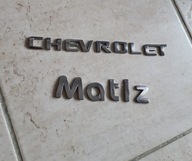 EMBLEMAT ZNACZEK KLAPY TYŁ CHEVROLET MATIZ 05-11