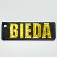 Personalizowany brelok BIEDA – zabawny gadżet, prezent na urodziny imieniny