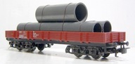 Marklin - wagon platforma 4-osiowa - DB z ładunkiem rur