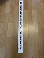 JEEP GRAND CHEROKEE WL 21 22 23 EMBLEMAT NAPIS Z DRZWI LEWY PRZÓD E