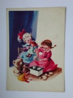 Bawiące się dziewczynki podają herbatę lalkom i misiowi M. ORŁOWSKA-GABRYŚ