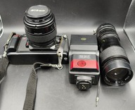 Aparat analogowy na kliszę Nikon plus obiektyw lampa z torbą Made in Japan