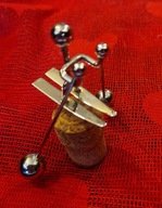 Narciarz wahadło zabawka biurkowa