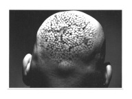 Pocztówka - Człowiek z 'drewnianym' tatuażem ...