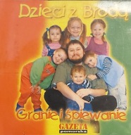 J. Broda Dzieci z Brodą Granie i śpiewanie
