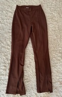 Brązowe materiałowe spodnie NLY trend 38 rozporki na nogawkach