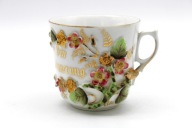 FILIŻANKA W RELIEFACH KAWA - HERBATA PORCELANA Z OKOŁO 1900 r