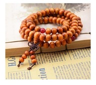 Mala buddyjski różaniec brązowy z nutą pomarańczy