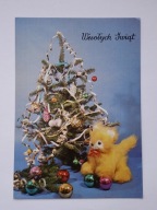 Piesek zabawka, maskotka - pocztówka świąteczna z PRL z 1976 r