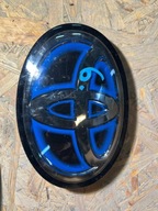 TOYOTA COROLLA E21 EMBLEMAT LOGO ZNACZEK POD RADAR 90975-02024