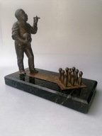 STARA FIGURA Z BRĄZU OKOŁO 100 LETNIA POSTAC GRAJACA W KRĘGLE NAGRODA