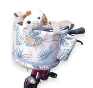 Wiosenny koszyk na rower w liście złote i zielone piękny koszyk prezentowy