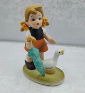 Dziewczyna z kiteczkami idzie z kaczuszką - figurka kolekcjonerska