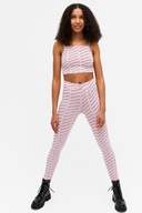 Monki legginsy leginsy różowe SISTERHOOD print wzór napisy Barbie pudrowe M