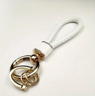 Biały brelok / smycz do kluczy – pleciony pasek z metalowymi elementami