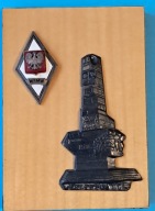 Deska z odznaką WSM i sylwetką pomnika na Westerplatte