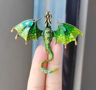 Broszka z zielonym smokiem dla WOŚP